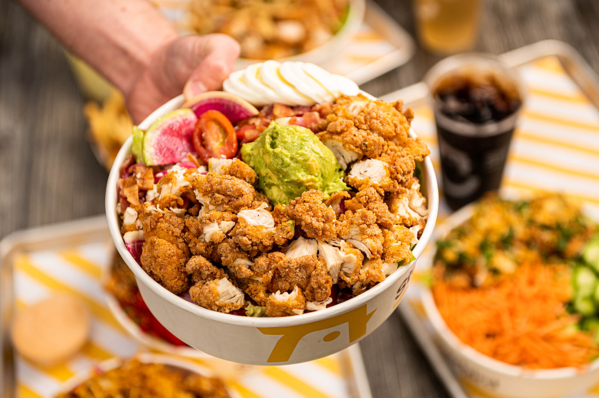 Trays of Starbird Chicken menu offerings