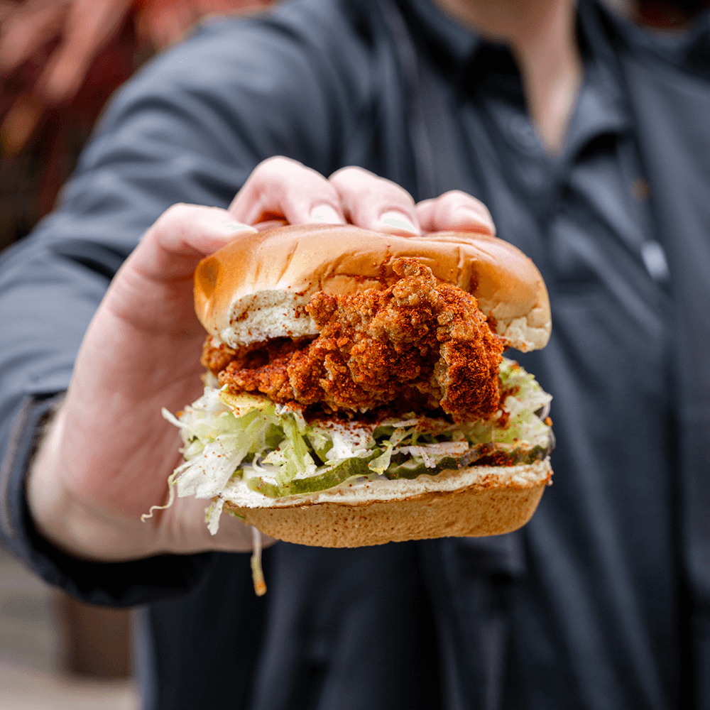 Person Holding Starbird Chicken Sandwich