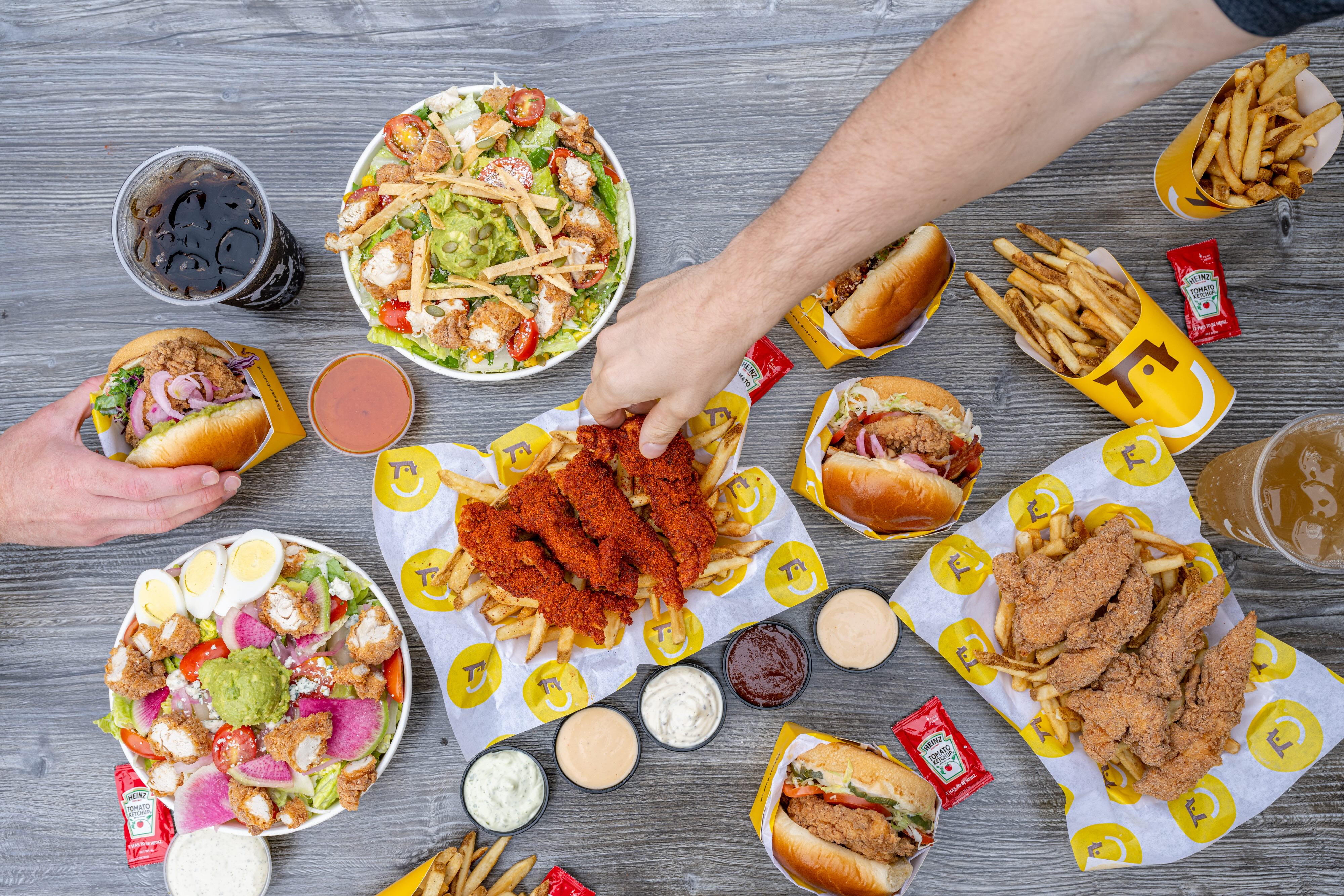 Trays of Starbird Chicken menu offerings